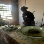 Women preparing food at a community event