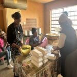 Prepared food being served at a SA Imbokodo event